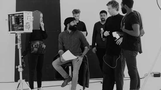 Crew asking questions while Sandeep is directing